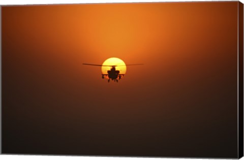 Framed AH-64D Apache Helicopter Flying into the Sun over Iraq Print