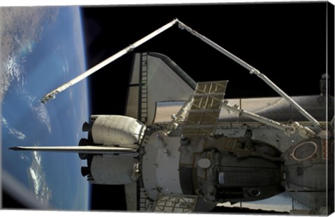 Framed Soyuz Vehicle and the Space Shuttle Discovery Docked to the International Space Station Print