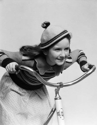 Framed 1930s Smiling Eager Little Girl In Knit Cap And Sweater Riding Bike Print
