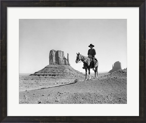 Framed Navajo Indian In Cowboy Hat On Horseback With Monument Valley Rock Formations In Background Print