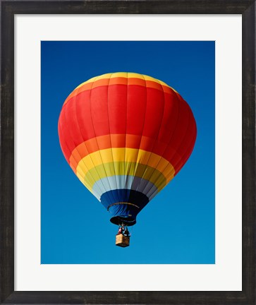 Framed Low angle view of a hot air balloon in the sky, New Mexico, Rainbow Print