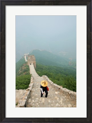 Framed Tourist climbing up steps on a wall, Great Wall of China, Beijing, China Print