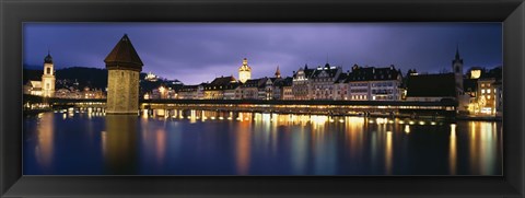 Framed Buildings lit up at dusk, Chapel Bridge, Reuss River, Lucerne, Switzerland Print