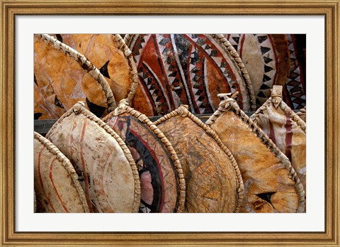 Framed Kenya. Handmade Masai shields at a roadside market Print
