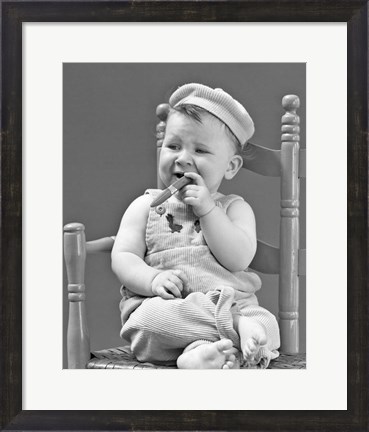 Framed 1940s Baby Sitting Chair Holding Cigar Print