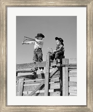 Framed 1950s Two Young Boys Dressed As Cowboys Print