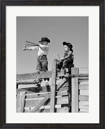 Framed 1950s Two Young Boys Dressed As Cowboys Print