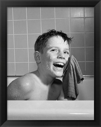 Framed 1950s 1960s Boy Washing Face Sitting In Bathtub Print