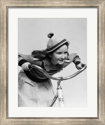 Framed 1930s Smiling Eager Little Girl In Knit Cap And Sweater Riding Bike Print