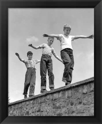 Framed 1950s Three Laughing Boys Walking On Top Of Stone Wall Print