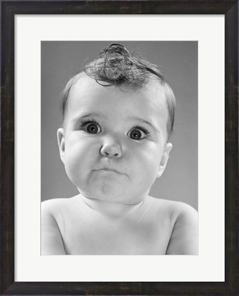 Framed 1950s Baby Making Funny Face With Eyes Wide Open Print