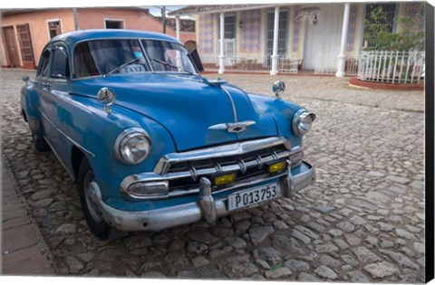 Framed Cuba, Trinidad Blue Taxi Parked On Cobblestones Print