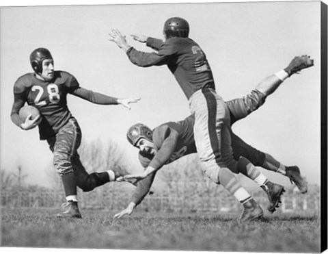 Framed Three Men Playing Football Print