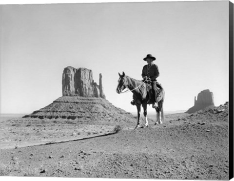 Framed Navajo Indian In Cowboy Hat On Horseback With Monument Valley Rock Formations In Background Print