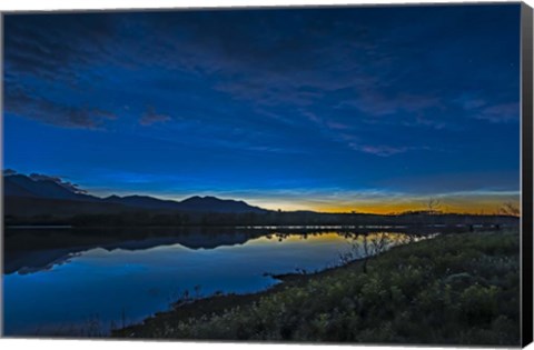Framed Noctilucent Clouds Glowing and Reflected in Calm Waters of the Waterton River Print