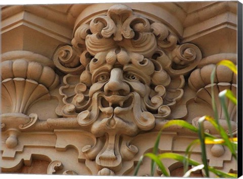 Framed Face In Stone On Buildings Wall Print