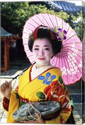 Framed Geisha holding a parasol, Kyoto, Japan Print