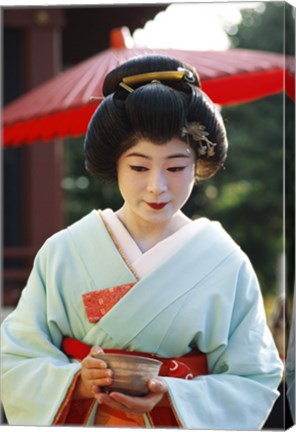 Framed Young woman dressed as a Geisha, Japan Print