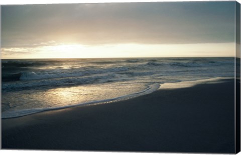 Framed Waves breaking on the beach at sunrise Print