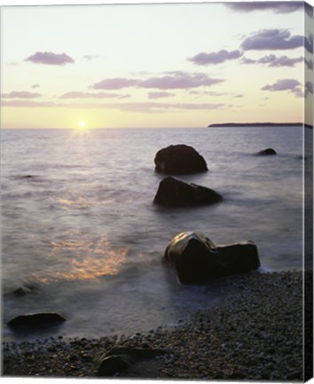 Framed Rocks on the beach at sunrise Print