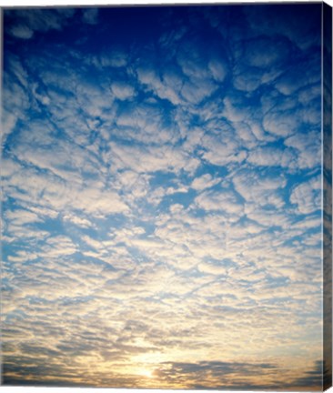 Framed Low angle view of sunrise seen through clouds Print