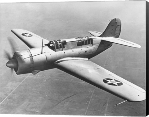 Framed High angle view of a fighter plane in flight, Curtiss SB2C Helldiver, December 1941 Print