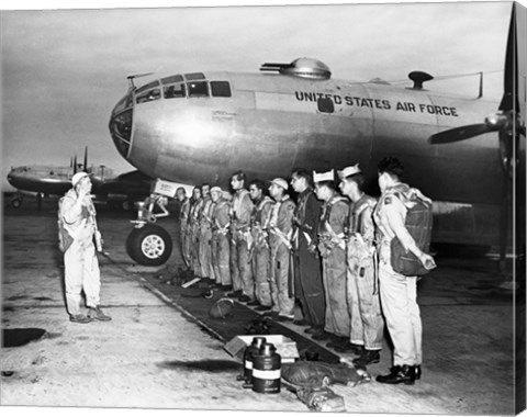 Framed Group of army soldiers standing in a row near a fighter plane, B-29 Superfortress Print