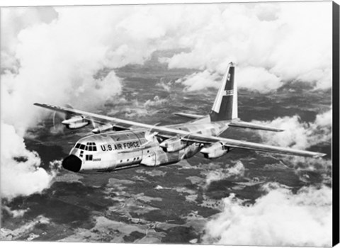 Framed High angle view of a military airplane in flight, C-130 Hercules Print