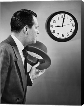 Framed Businessman looking at clock Print