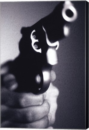 Framed Close-up of a person holding a handgun Print
