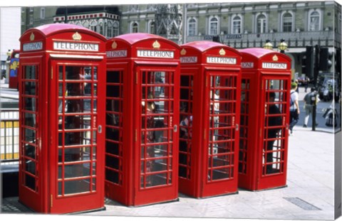 Framed Telephone booths in a row, London, England Print