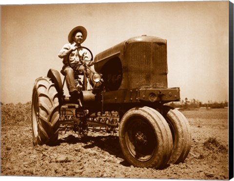 Framed Farmer Plowing a Field with a Tractor Print