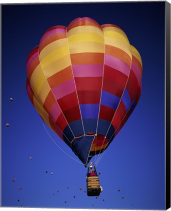 Framed Low angle view of a hot air balloon rising, Albuquerque International Balloon Fiesta, Albuquerque, New Mexico, USA Print