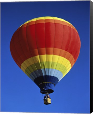 Framed Low angle view of a hot air balloon rising, Albuquerque International Balloon Fiesta, Albuquerque, New Mexico, USA Print