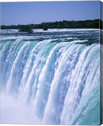 Framed Water flowing over Niagara Falls, Ontario, Canada Print