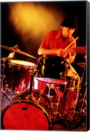 Framed Male drummer playing drums Print