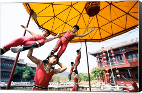 Framed Group of children performing acrobatics, Shanghai, China Print