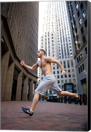 Framed Side profile of a young man running in a city Print