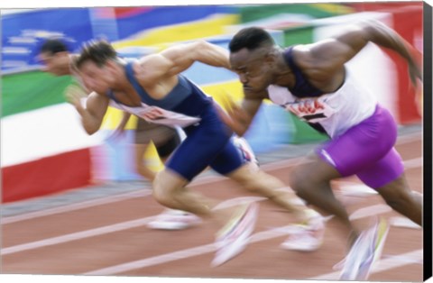 Framed Side profile of three men running low on a running track Print