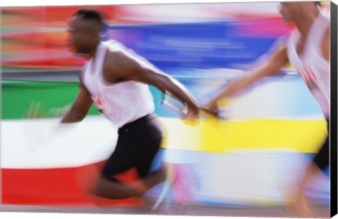 Framed Side profile of two young men passing a relay baton Print