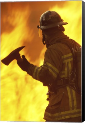 Framed Firefighter holding an axe Print