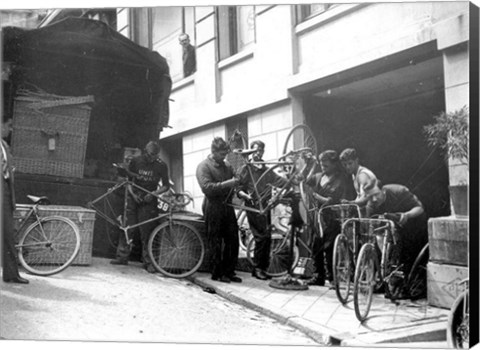 Framed Taking care of  maintenance of the racing bicycles during a rest day in Belfort Print