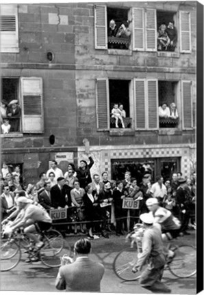 Framed People watching the cyclists being provisioned. Tour de France 1958. Print