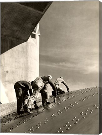 Framed Three construction workers putting a coat of paint on a slanted wall of riveted-steel plates on the Hoover Dam spillway Print