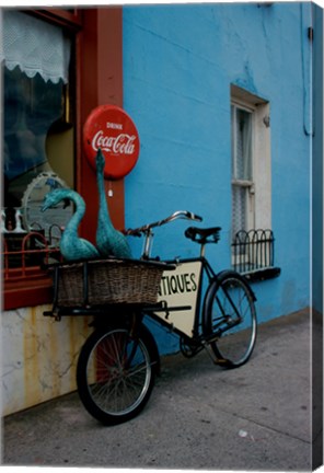 Framed Statues of swans in a basket on a bicycle, Lahinch, Ireland Print