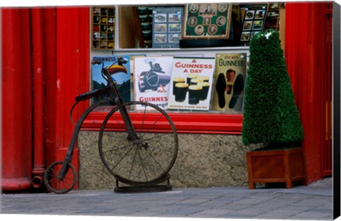 Framed Old bicycle in front of a store, Kilkenny, Ireland Print