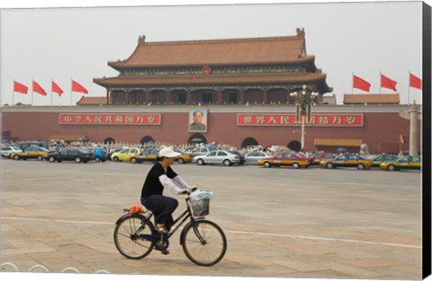 Framed Tourist riding a bicycle at a town square, Tiananmen Gate Of Heavenly Peace, Tiananmen Square, Beijing, China Print
