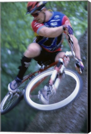 Framed Young man on a bicycle Print