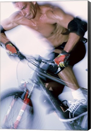 Framed Close-up of a young man riding a bicycle Print