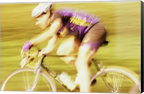 Framed Side profile of a young man cycling Print